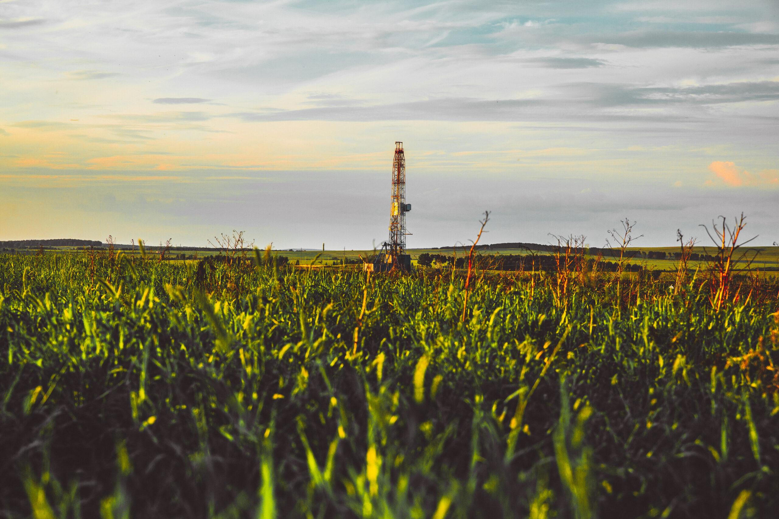 Land drilling rig in a field